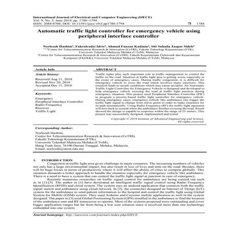 Automatic traffic light controller for emergency vehicle using peripheral int...