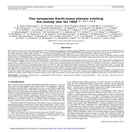 Two temperate Earth-mass planets orbiting the nearby star GJ 1002
