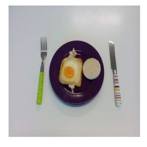 Making a fried egg in a toast - work skill