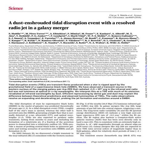 A dust-enshrouded tidal disruption event with a resolved radio jet in a galax...